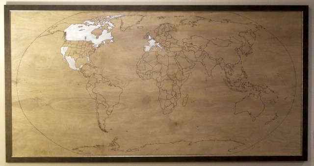 Travel Map. Woodburned, stained, and countries painted in with acrylic, on wood. 2016.